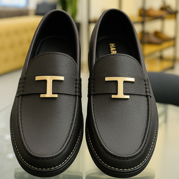 T BUCKEL WITH BLACK SOLE
